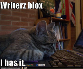 https://notallaboutcats.files.wordpress.com/2013/03/funny-pictures-cat-has-writers-block.jpg